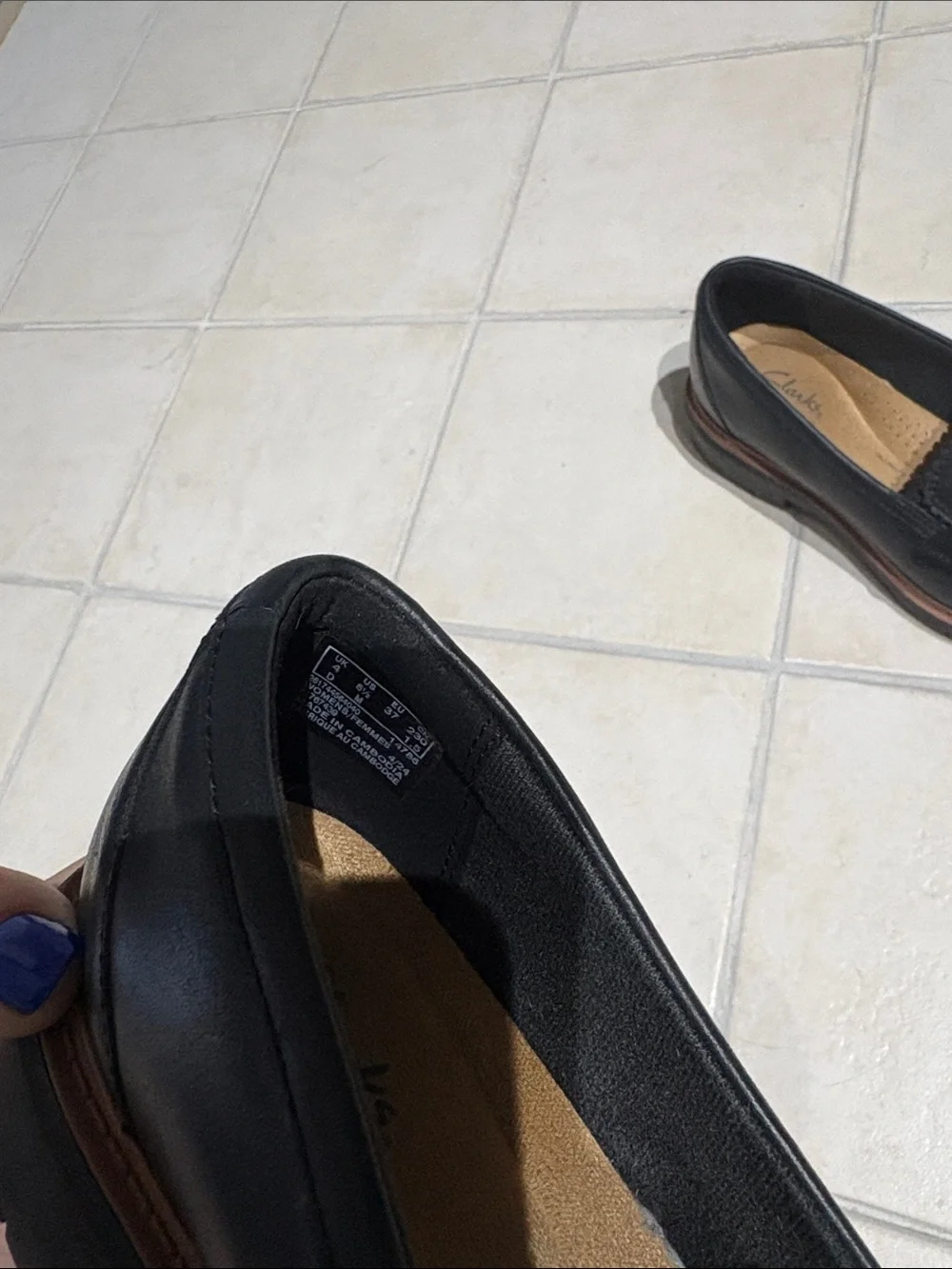 Clarks Black Leather Tassel-Style Slip-On Loafers with Brown Sole Accent